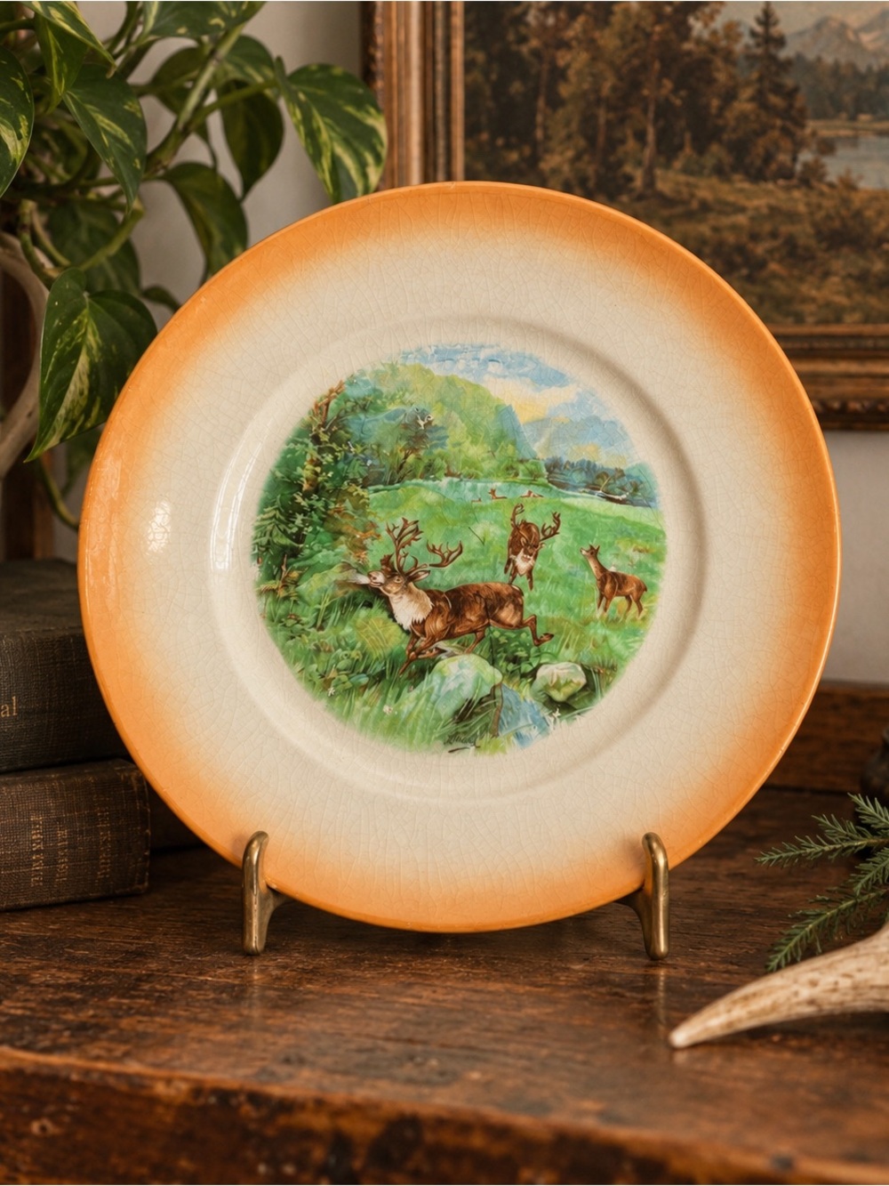 Vintage Orange-Trim Ceramic Plate with Deer Meadow Scene